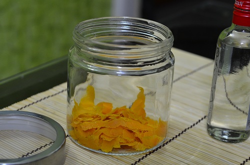 Orange zest in glass jar